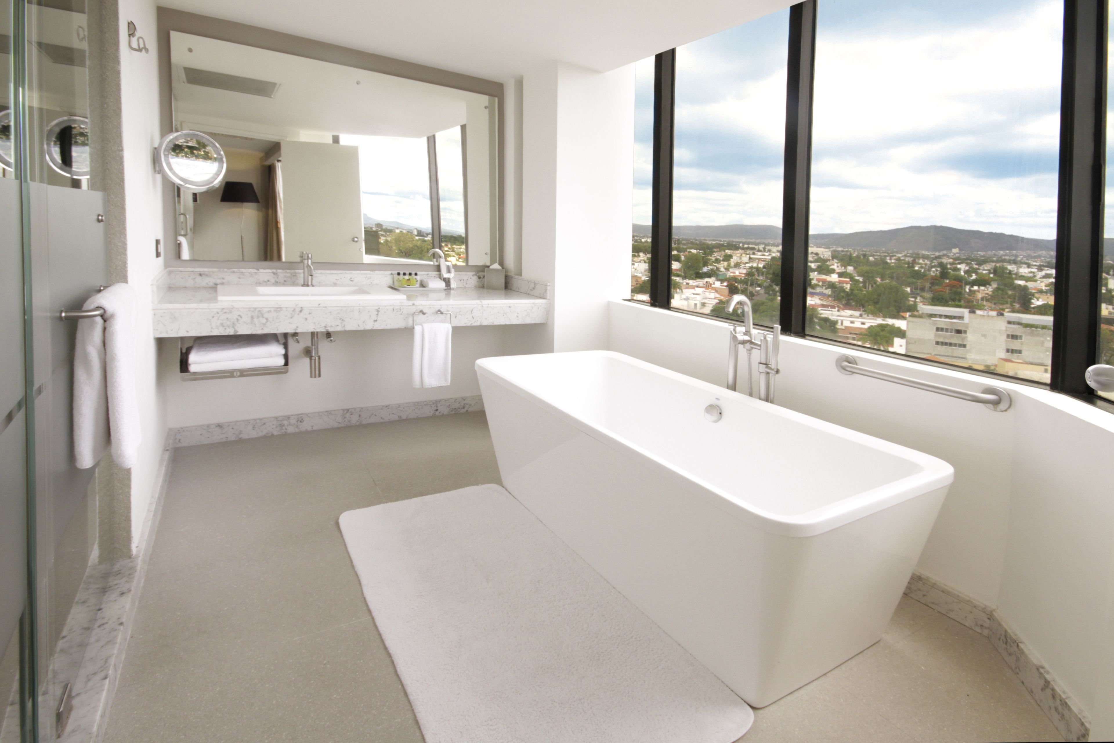 suite (ambassador) | bathroom | shower, free toiletries, hair dryer, towels