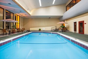 Indoor pool, open 6:00 AM to 10:00 PM, pool loungers