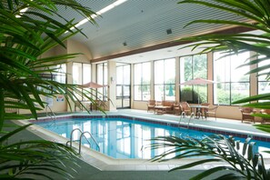 Indoor pool, open 6:00 AM to 10:00 PM, pool loungers