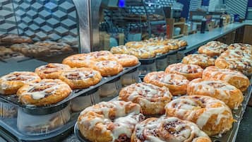 A display of pastries in a bakery setting.