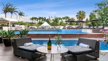 Outdoor pool, open 6:00 AM to 8:00 PM, pool umbrellas, sun loungers