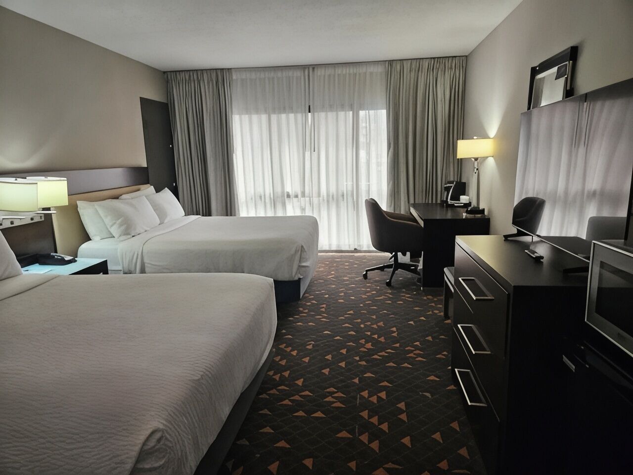 Premium bedding, desk, blackout curtains, iron/ironing board