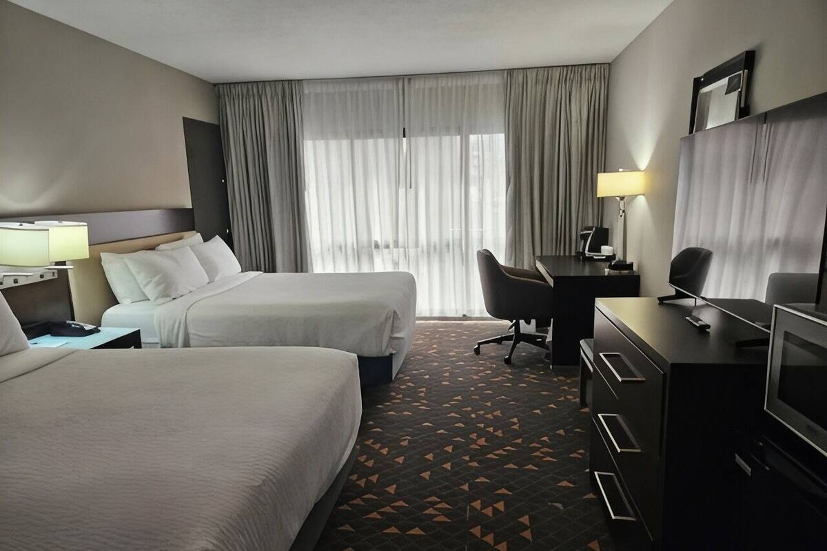 Premium bedding, desk, blackout drapes, iron/ironing board