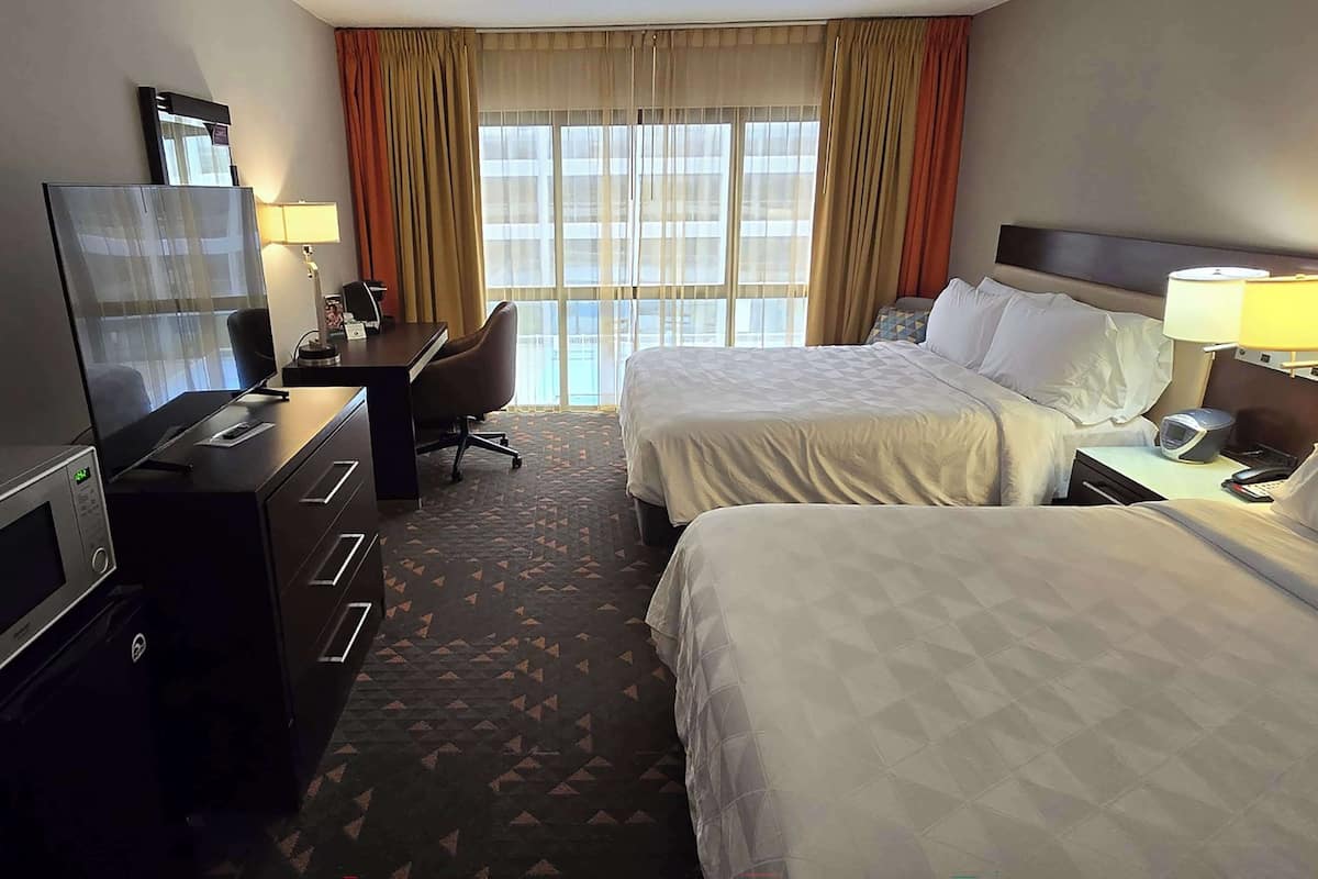Premium bedding, desk, blackout drapes, iron/ironing board