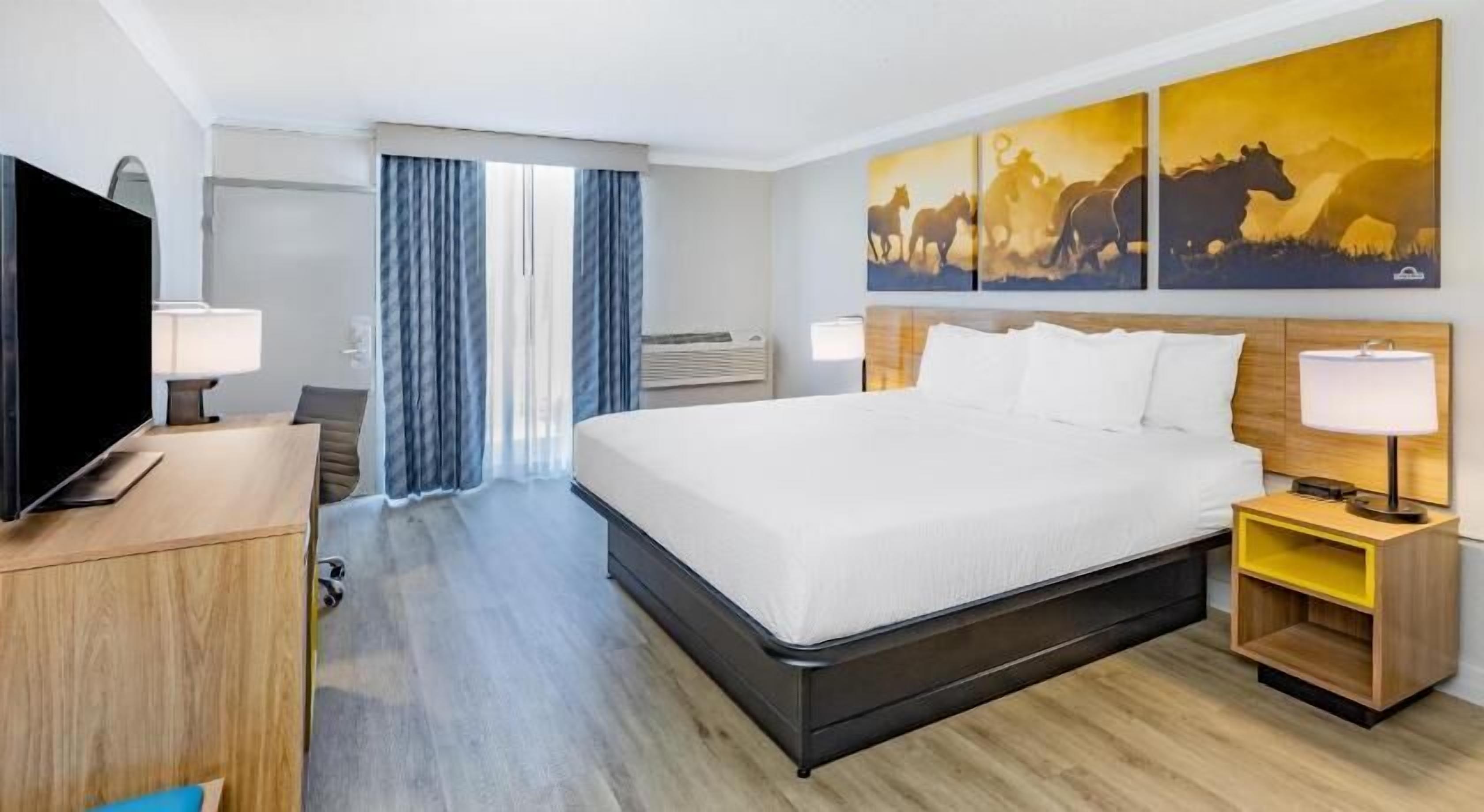 Pillow-top beds, desk, blackout curtains, iron/ironing board