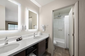 Superior Room, 1 King Bed, Non Smoking | Bathroom | Combined shower/tub, eco-friendly toiletries, hair dryer, towels