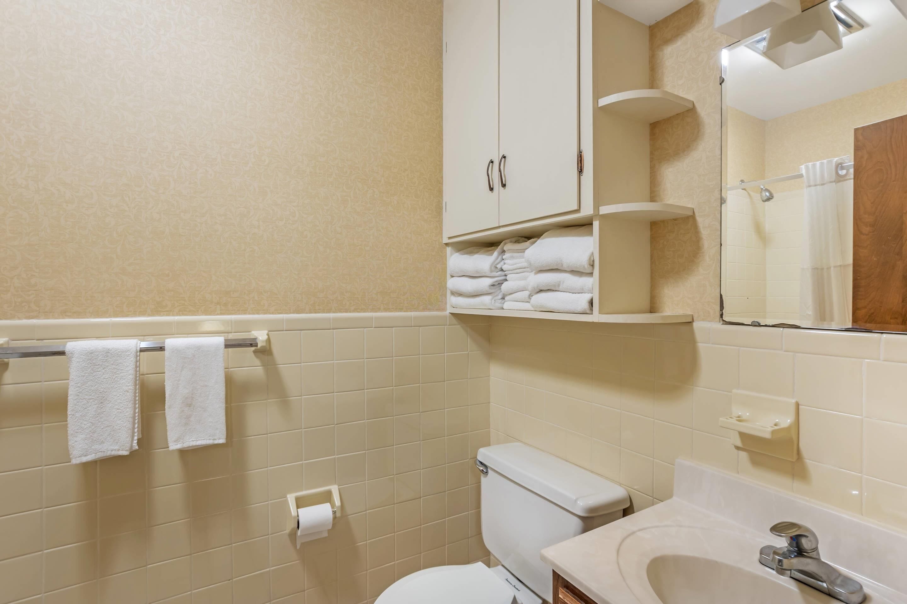 in-room safe, desk, blackout curtains, iron/ironing board