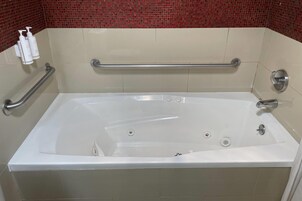 Room, 1 Queen Bed, Accessible, Smoking (Mobility) | Bathroom | Combined shower/tub, deep soaking tub, free toiletries, hair dryer