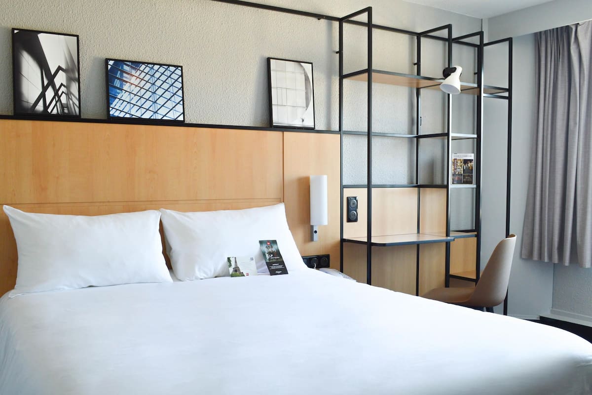 Habitación estándar, 1 cama individual | Ropa de cama de alta calidad y caja de seguridad en la habitación