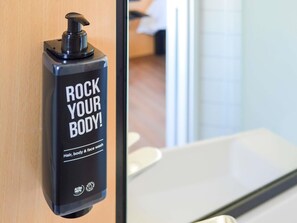 Shower, eco-friendly toiletries, hair dryer, towels