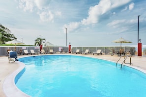 Outdoor pool, open 8:00 AM to 10:00 PM, sun loungers