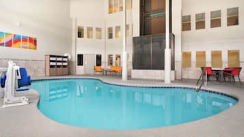 Indoor pool, a heated pool, open 9:00 AM to 10:00 PM, sun loungers