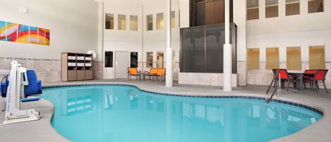 Indoor pool, a heated pool, open 9:00 AM to 10:00 PM, sun loungers