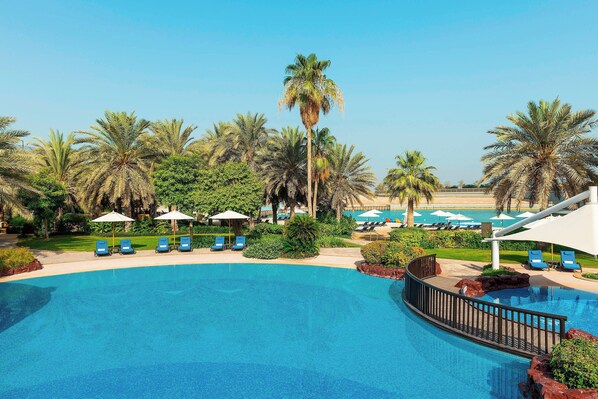 3 outdoor pools, open 8:00 AM to 6:00 PM, pool umbrellas, pool loungers
