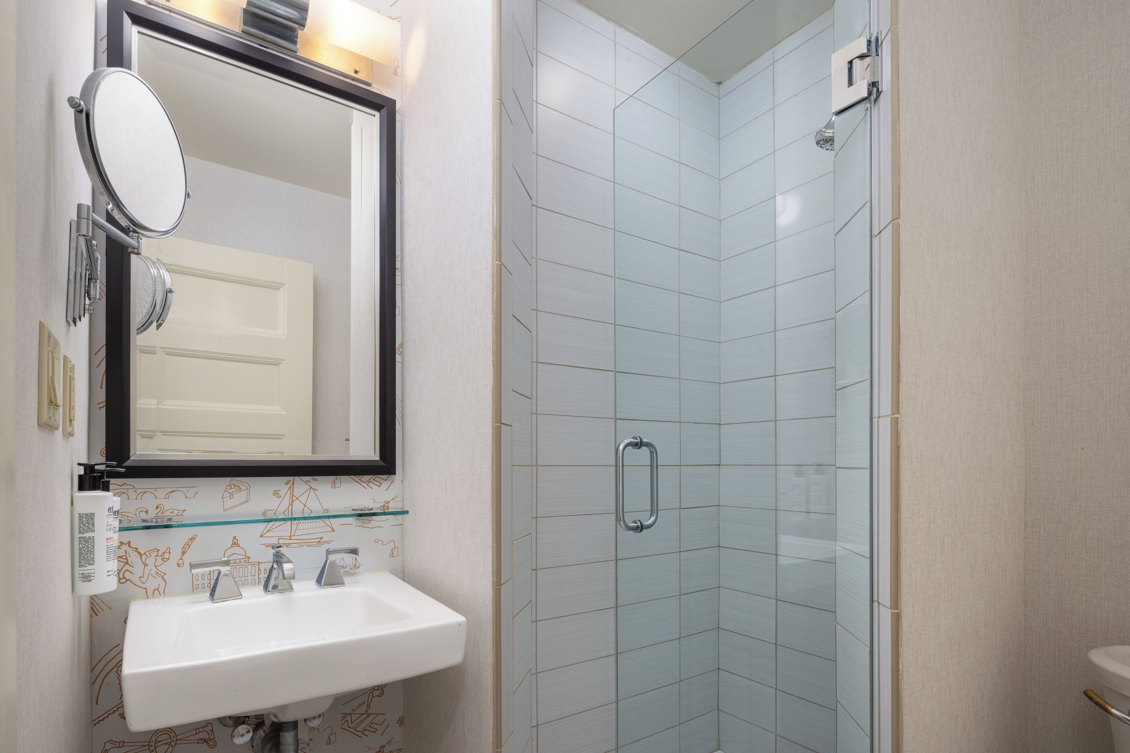 premier room 1 king | bathroom | designer toiletries, hair dryer, towels, soap