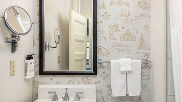 Designer toiletries, hair dryer, towels, soap