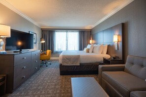 Premium bedding, pillow-top beds, desk, laptop workspace