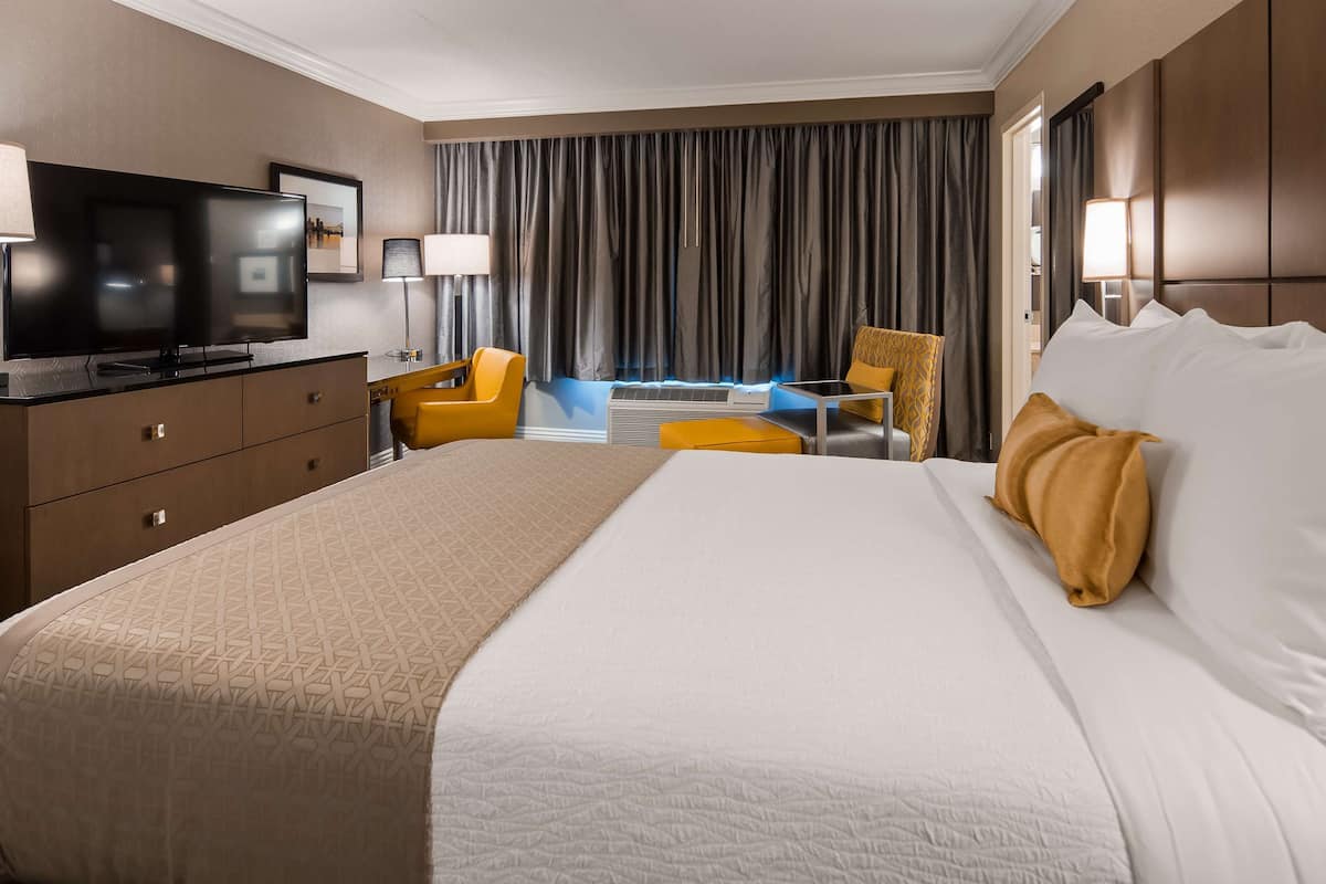 premium bedding, pillow-top beds, desk, laptop workspace