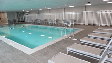 Indoor pool, open 7:00 AM to 11:00 PM, pool loungers