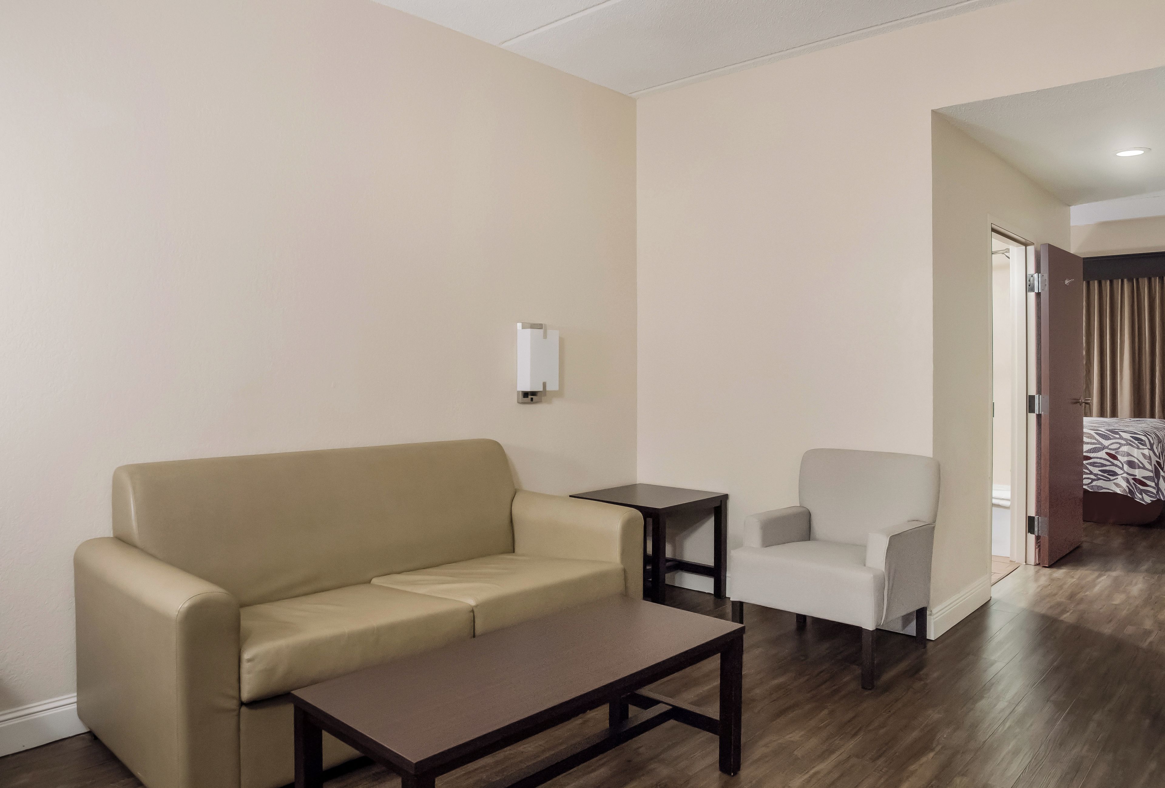 Suite, 1 King Bed, Non Smoking | Desk, blackout drapes, iron/ironing board, cribs (free)