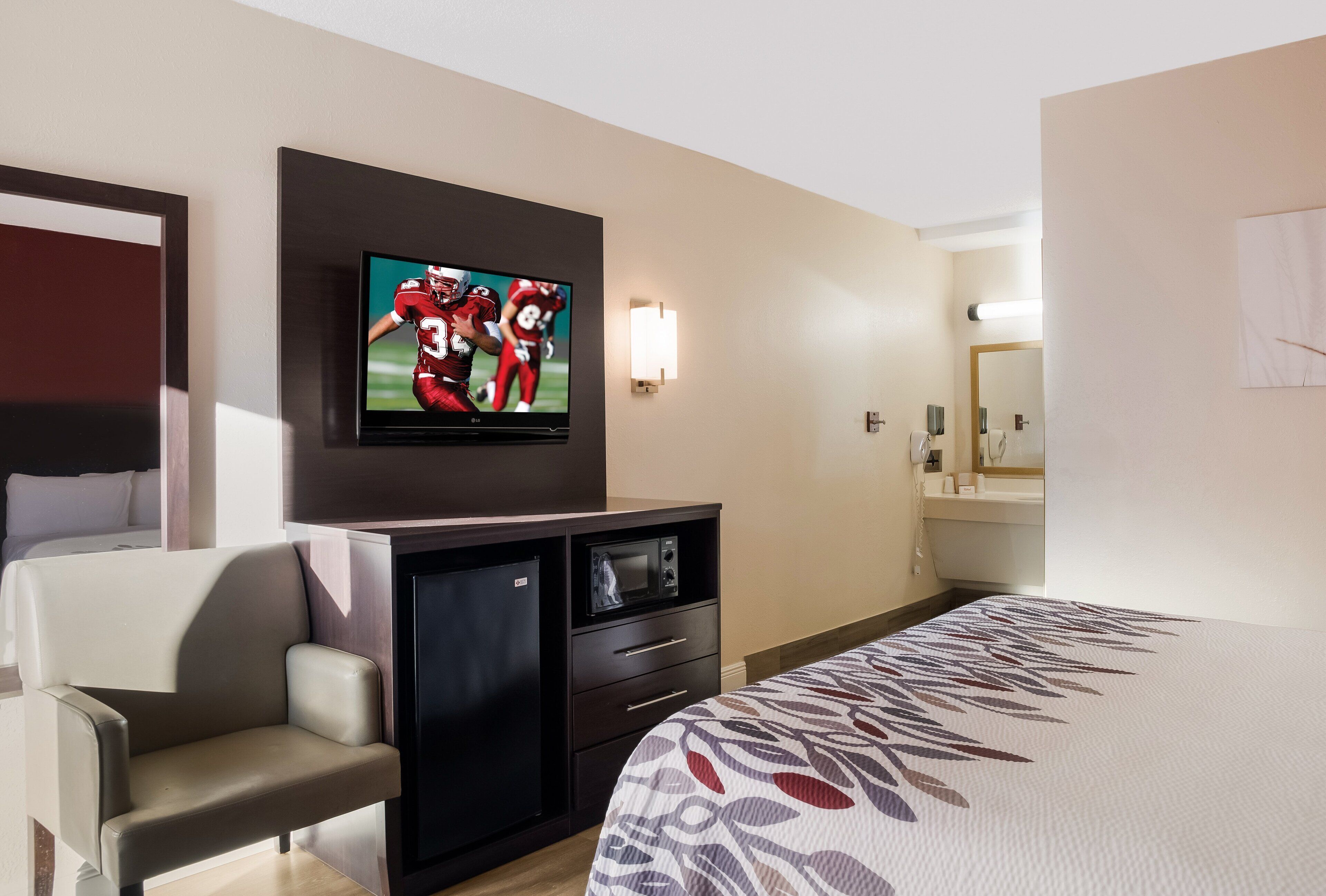 desk, blackout curtains, iron/ironing board, free cots/infant beds