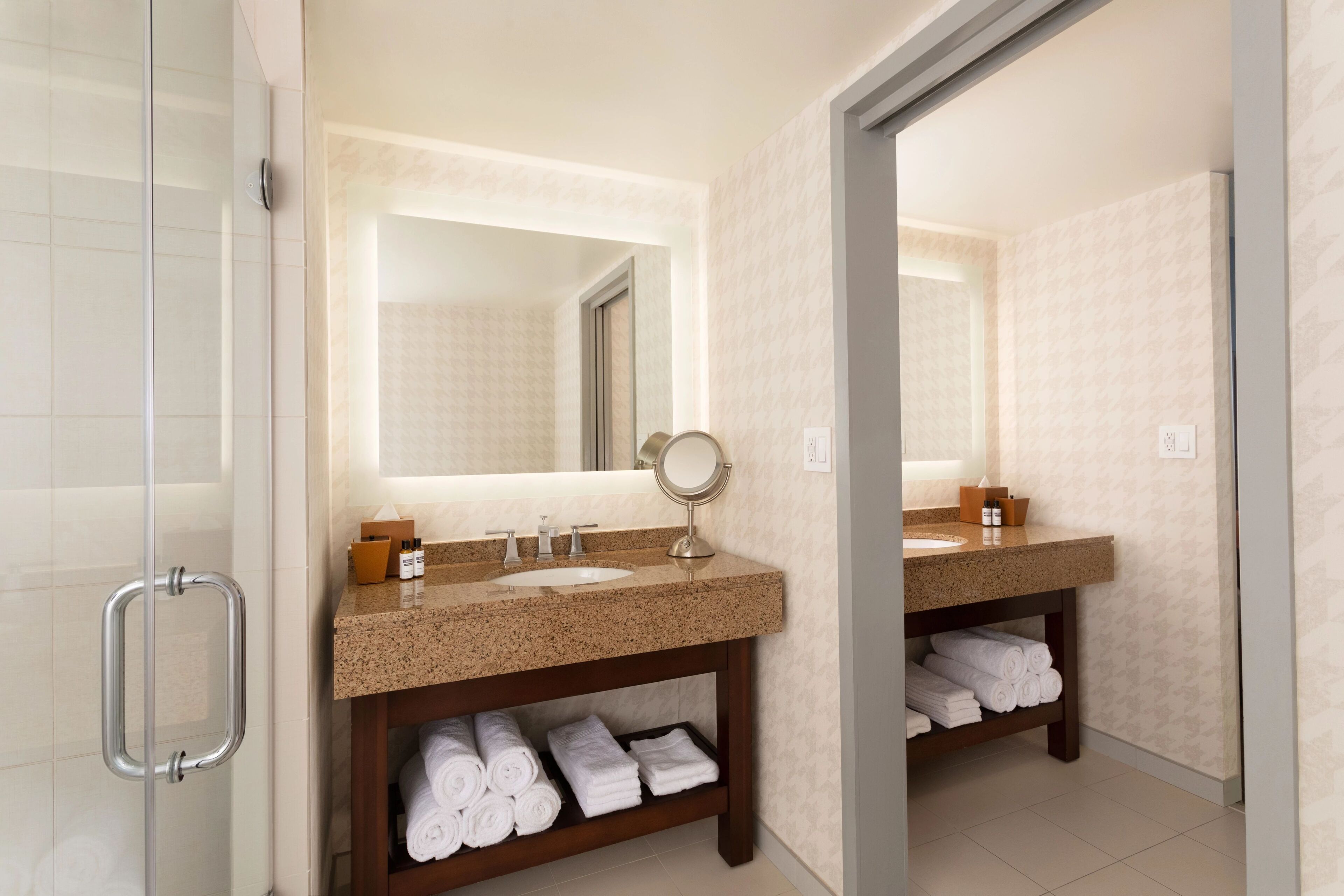 executive suite | bathroom | shower, designer toiletries, hair dryer, towels