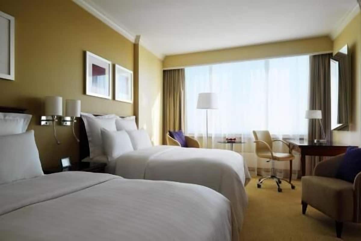 Pillow-top beds, minibar, in-room safe, desk