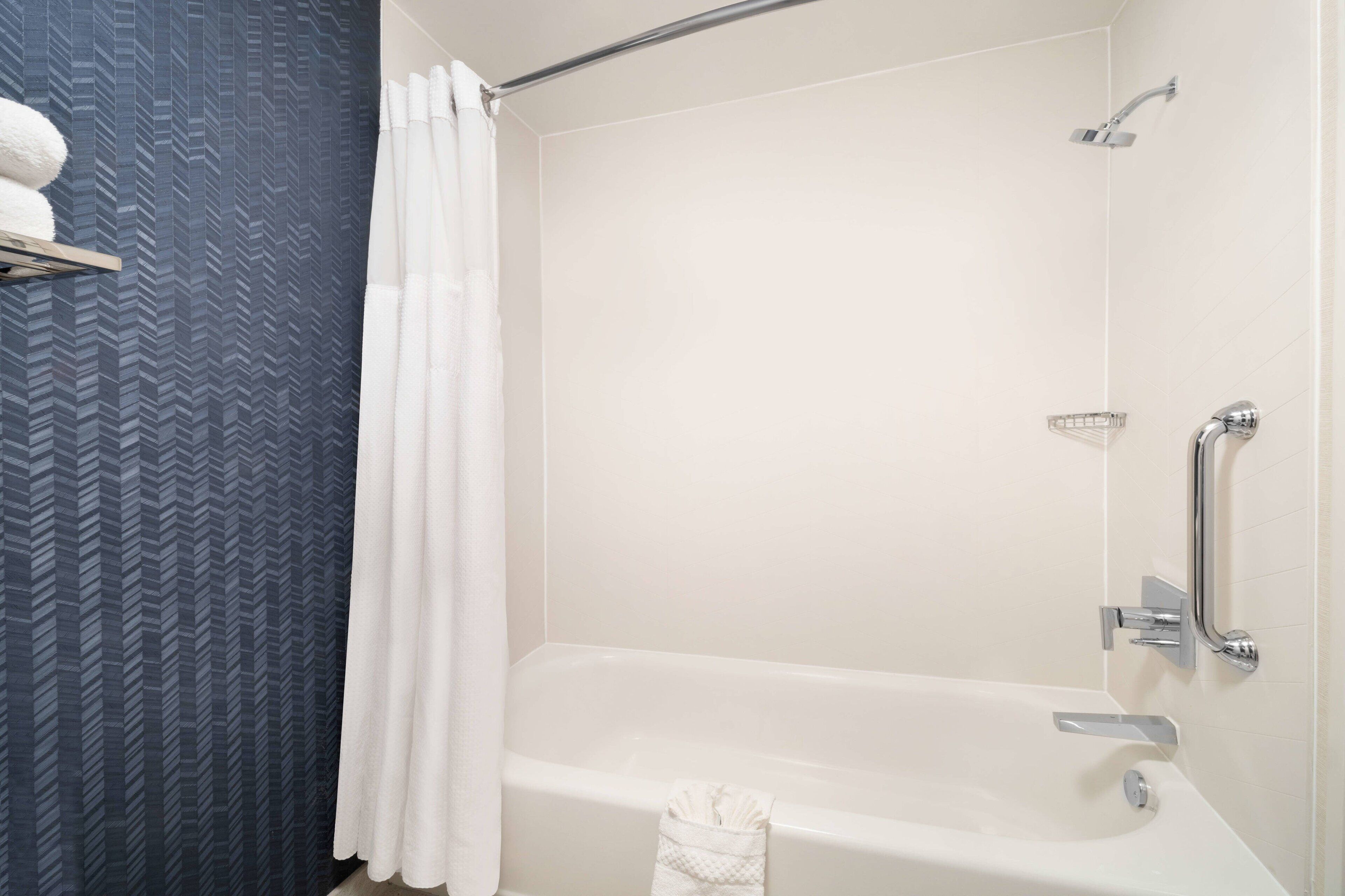 combined shower/bathtub, free toiletries, hair dryer, towels