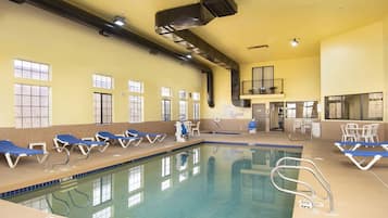 Indoor pool, open 6:00 AM to 10:00 PM, pool loungers