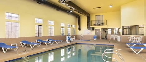 Indoor pool, open 6:00 AM to 10:00 PM, pool loungers