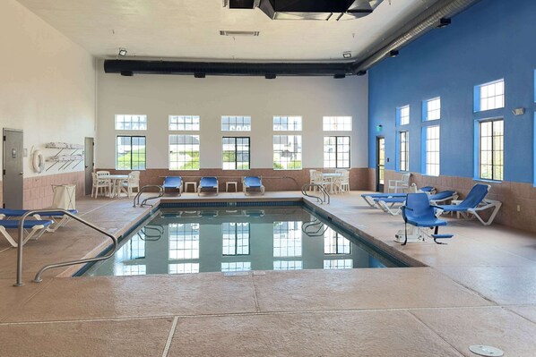 Indoor pool, open 6:00 AM to 10:00 PM, sun loungers