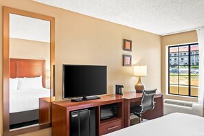 Down comforters, pillowtop beds, desk, blackout drapes