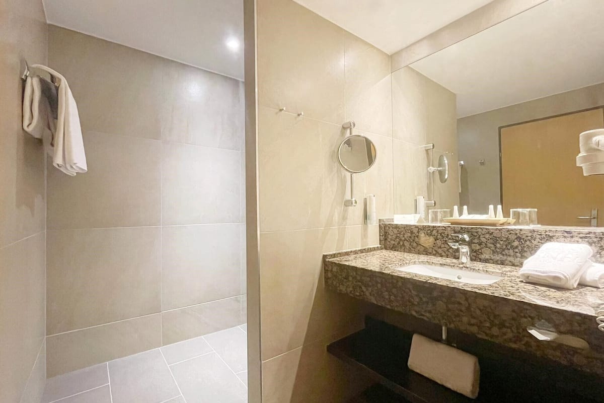 hair dryer, bathrobes, towels, soap