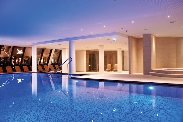 Indoor pool, outdoor pool, pool umbrellas, sun loungers