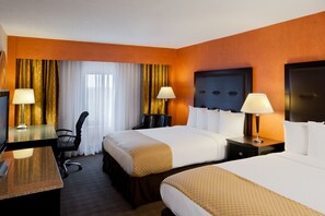 Premium bedding, down comforters, pillowtop beds, in-room safe