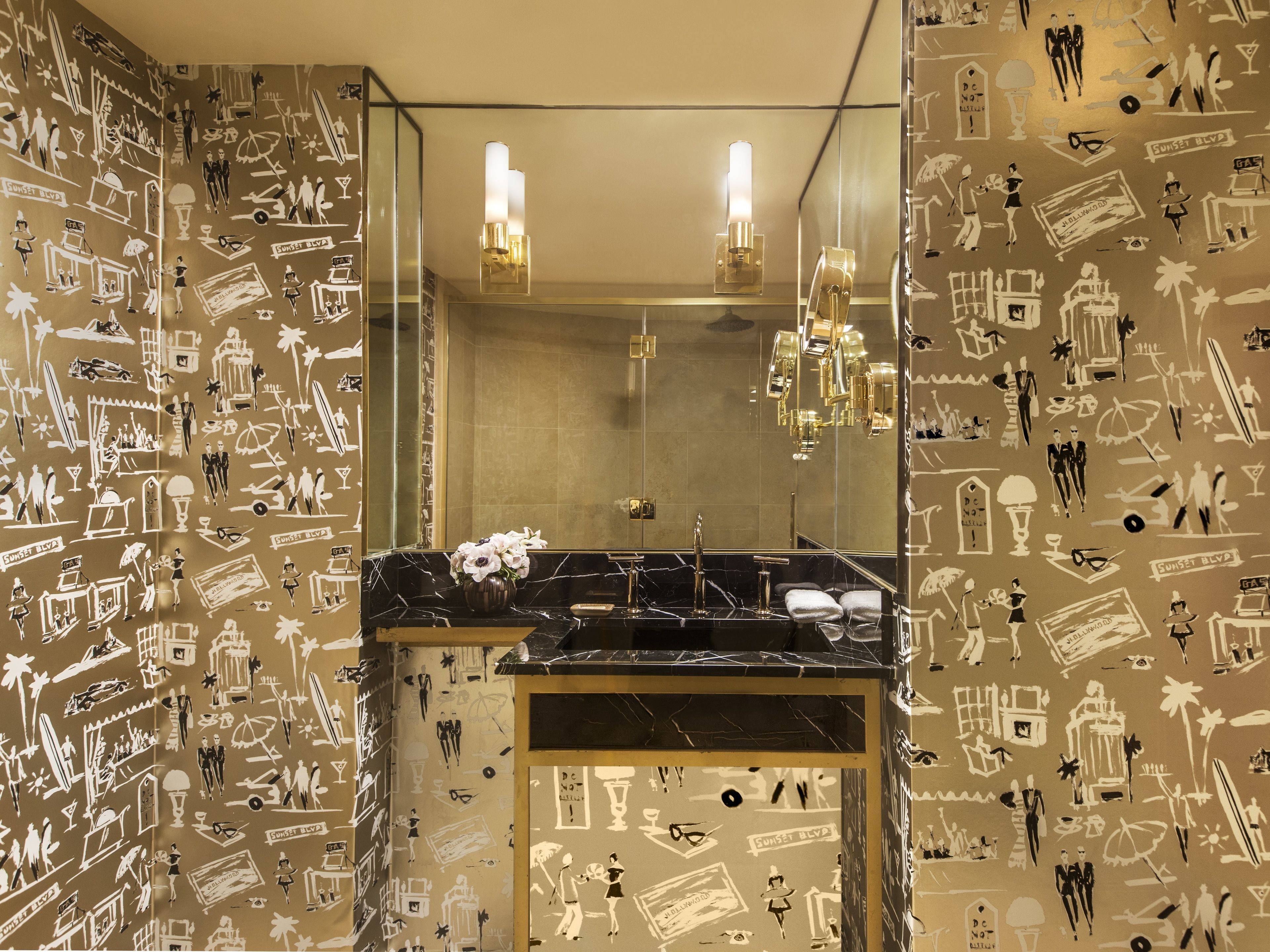 designer toiletries, hair dryer, bathrobes, slippers