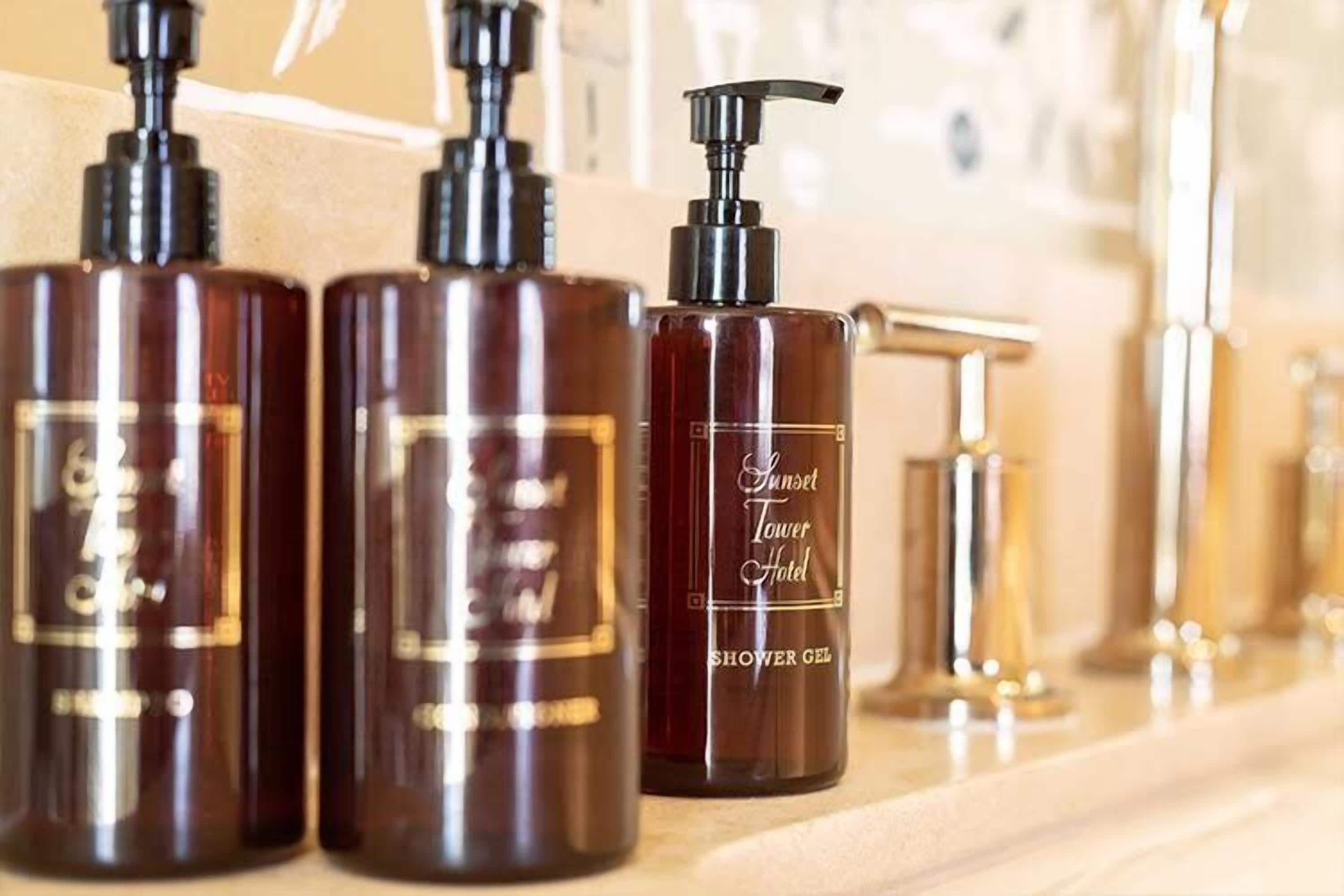 townhouse suite | bathroom | designer toiletries, hair dryer, bathrobes, slippers