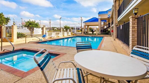 Outdoor pool, open 9:00 AM to 11:00 PM, pool loungers