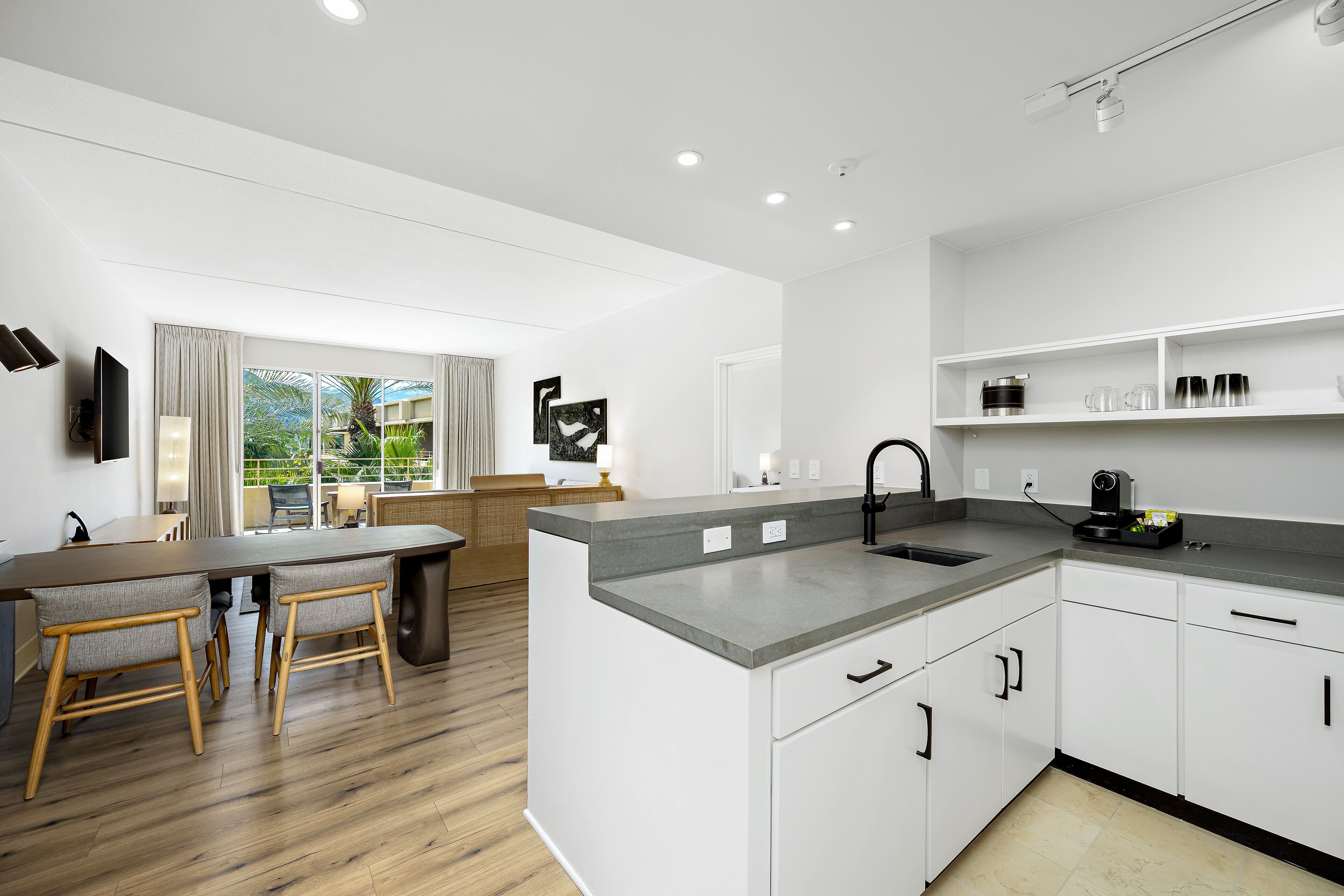 grand suite | living area | 65-inch flat-screen tv with satellite channels, tv, pay films