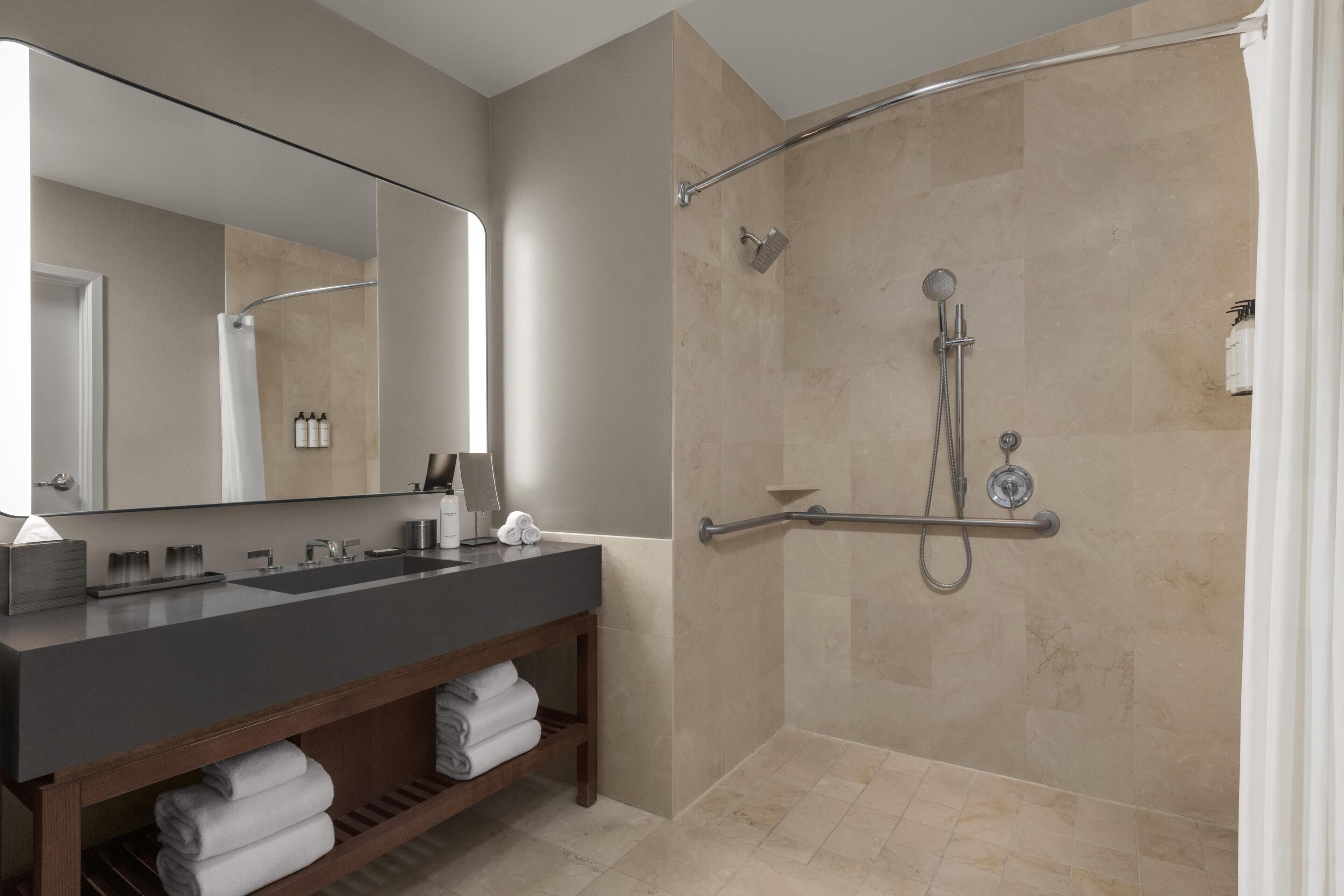 Separate tub and shower, free toiletries, hair dryer, bathrobes