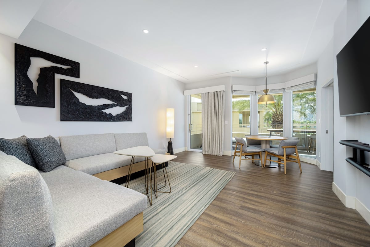 65-inch flat-screen TV with satellite channels, TV, pay movies