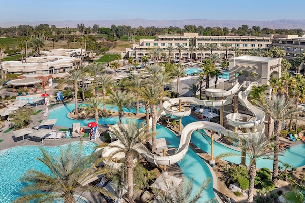 9 outdoor pools, open 7:00 AM to 10:00 PM, cabanas (surcharge)