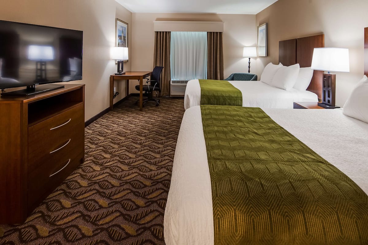 Down comforters, desk, laptop workspace, blackout drapes