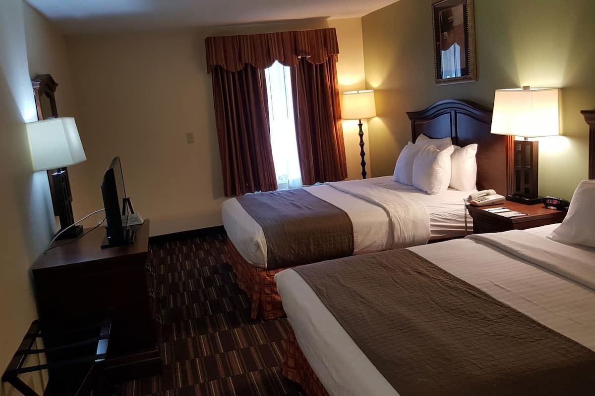 Camas con pillow-top, escritorio y espacio para trabajar con laptop