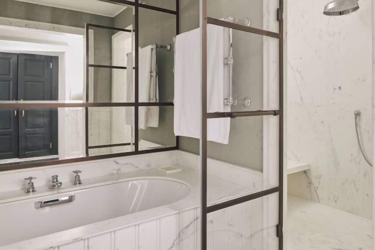 Bathroom | Combined shower/bathtub, rainfall showerhead, hair dryer, bathrobes