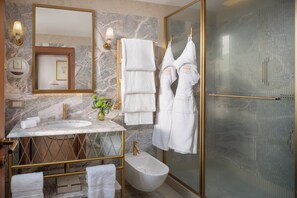 Combined shower/bathtub, free toiletries, hair dryer, bathrobes