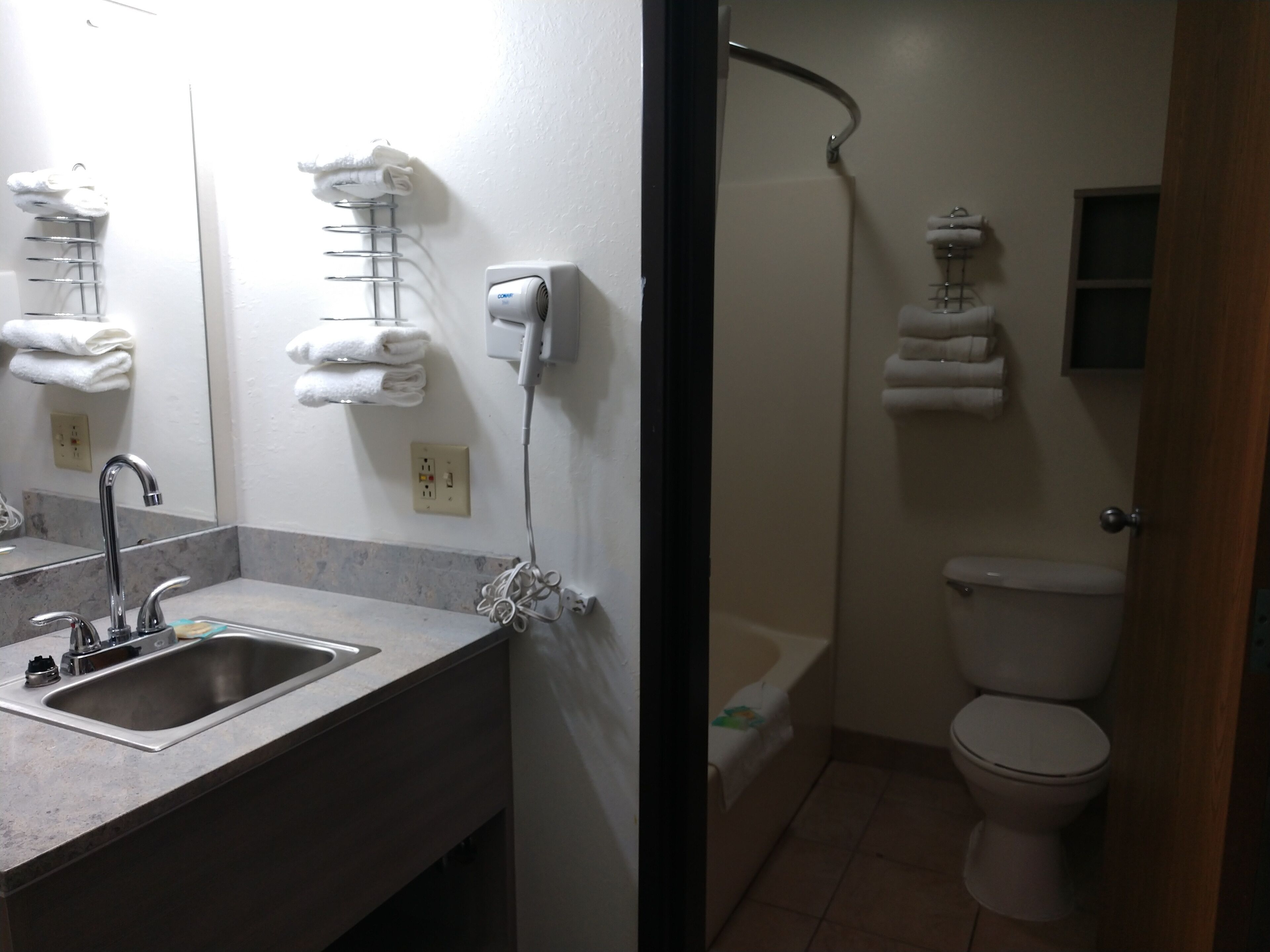 combined shower/bathtub, free toiletries, hair dryer, towels