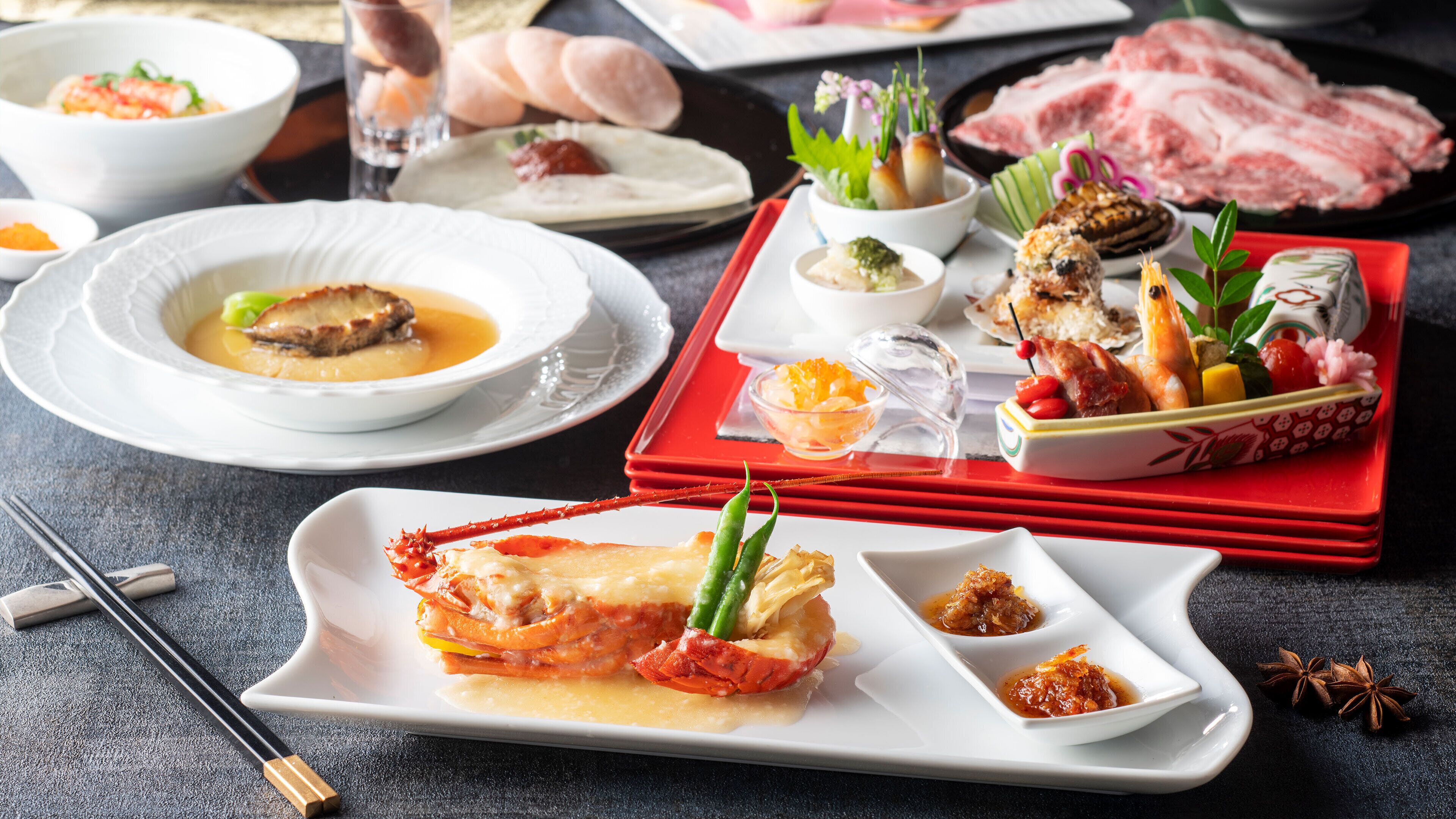 A variety of dishes including seafood, vegetables, and sauces on a dining table.