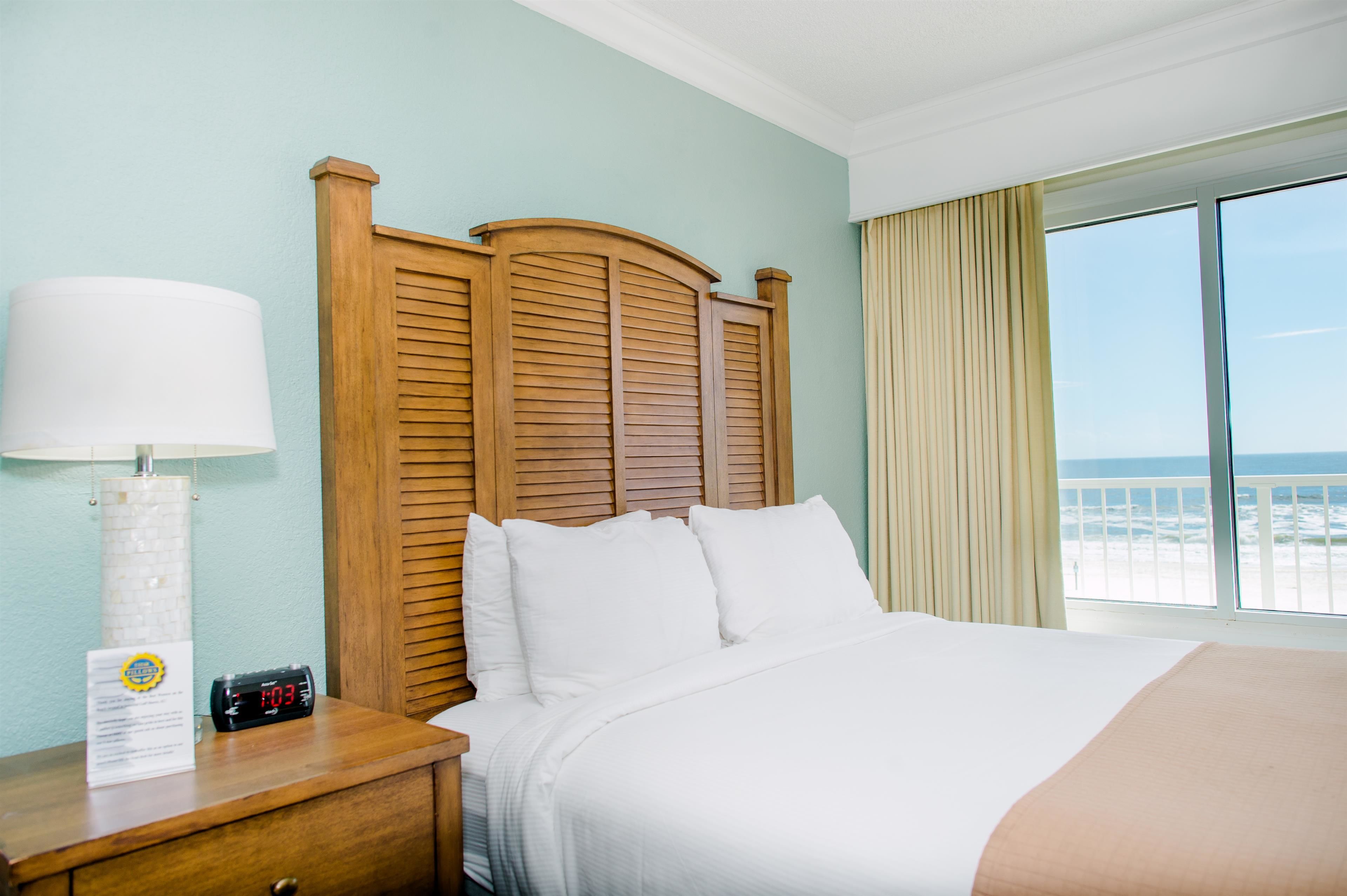 standard room, 2 queen beds, non smoking, kitchenette | blackout curtains, iron/ironing board, cots/infant beds, rollaway beds