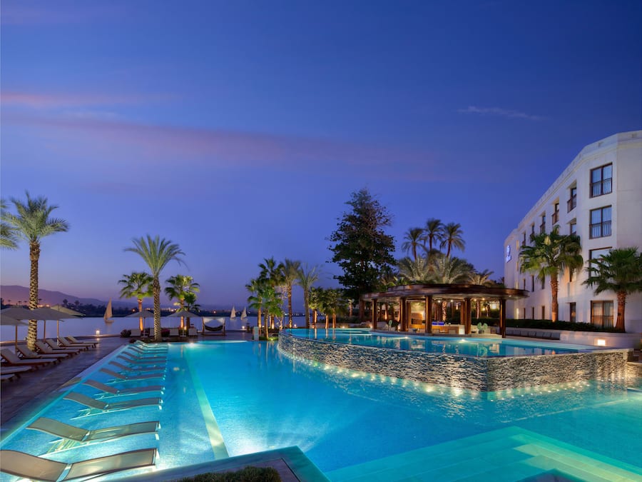 2 outdoor pools, open 9:00 AM to 10:00 PM, pool umbrellas, sun loungers